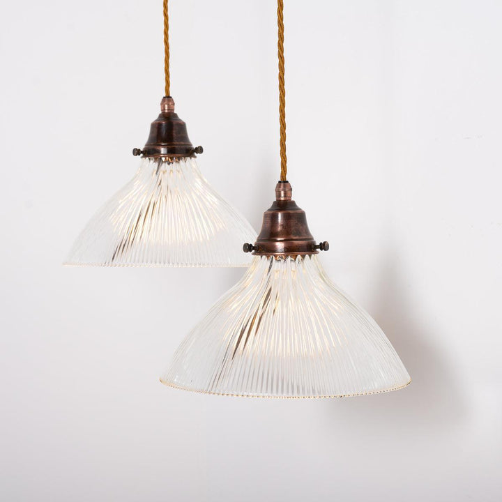 Pair of Antique Holophane Pendant Lights with Aged Copper Fittings