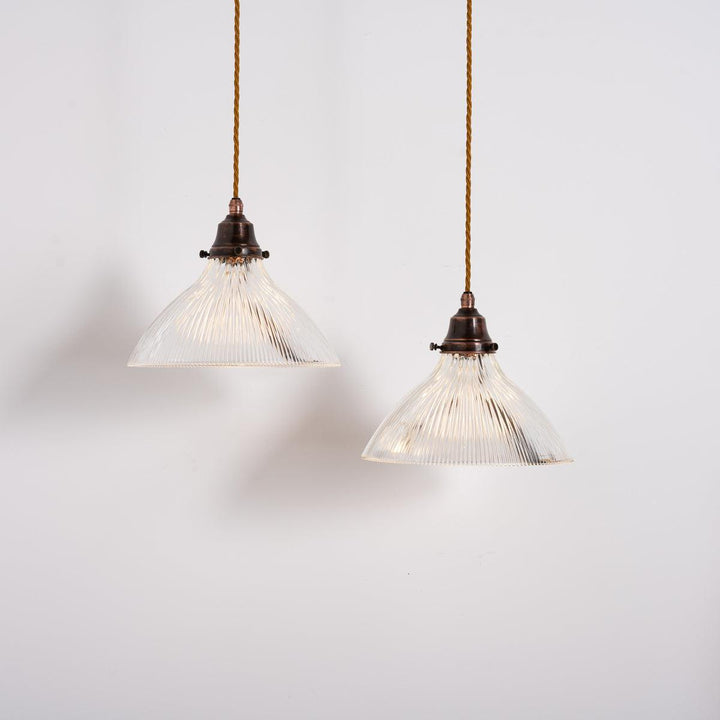 Pair of Antique Holophane Pendant Lights with Aged Copper Fittings