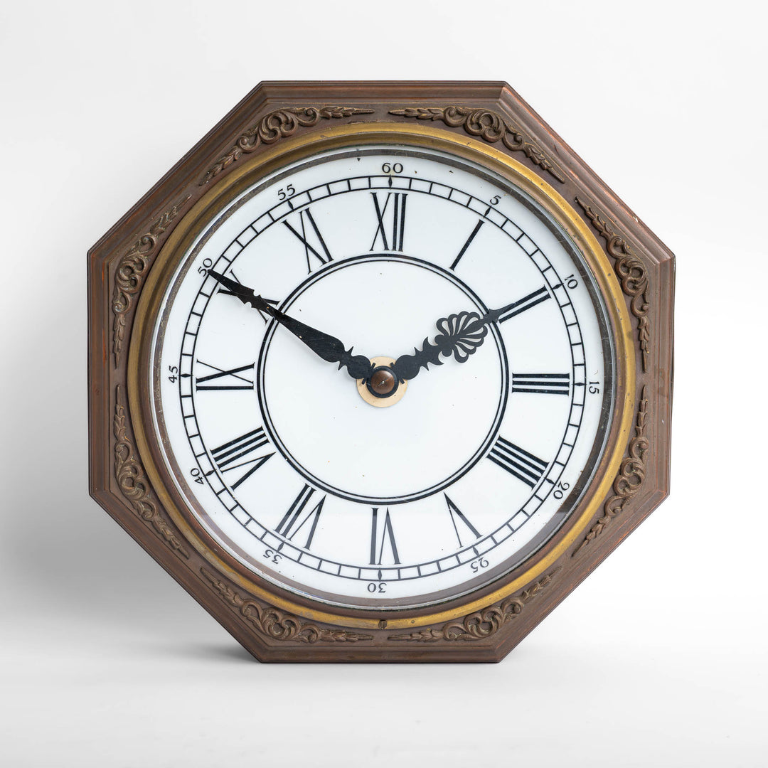 RARE OCTAGONAL COPPER WALL CLOCK WITH ILLUMINATED OPAL GLASS DIAL BY GILLETT & JOHNSTON