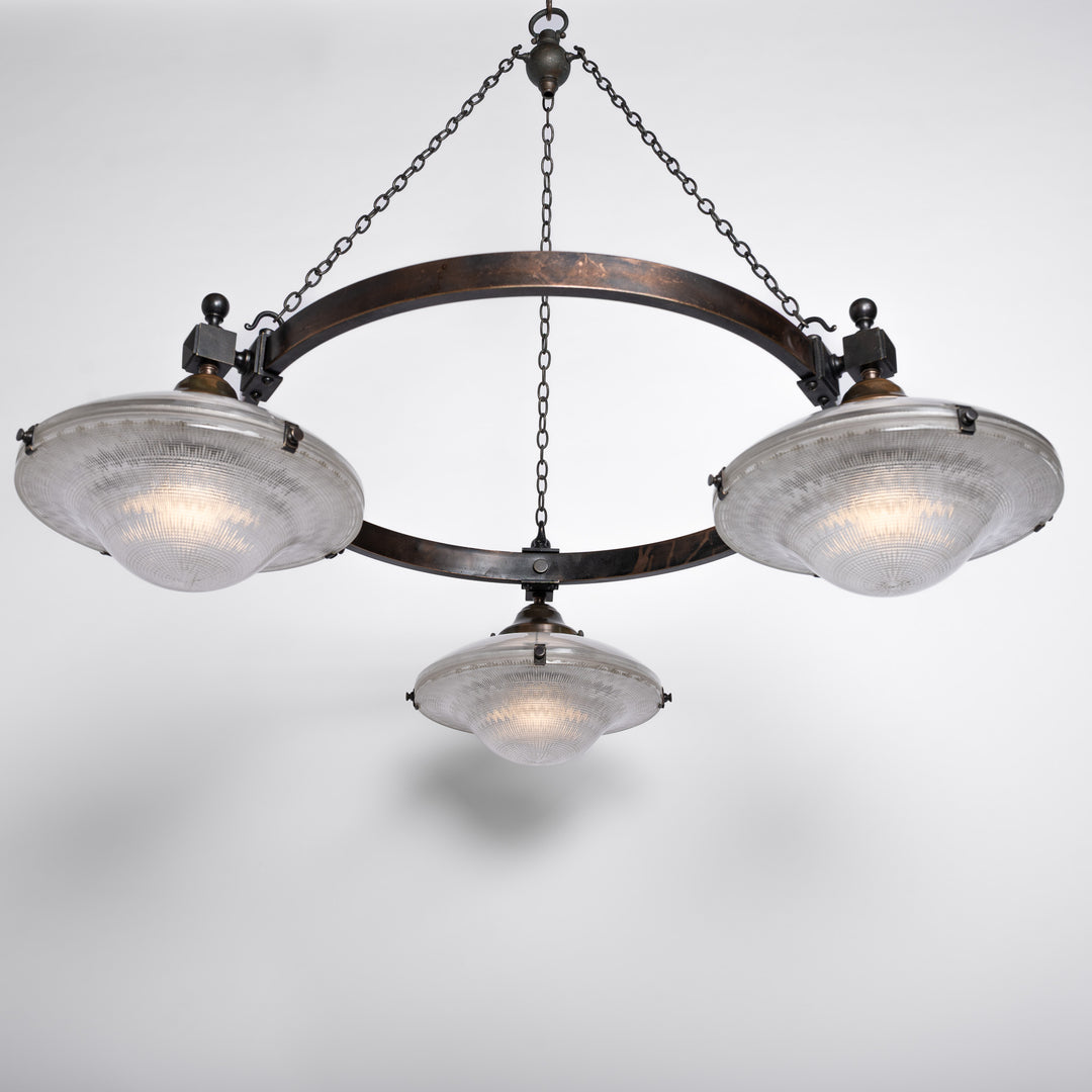 Rare Pair of Monumental Scale Antique Holophane Bronze Ring Chandeliers