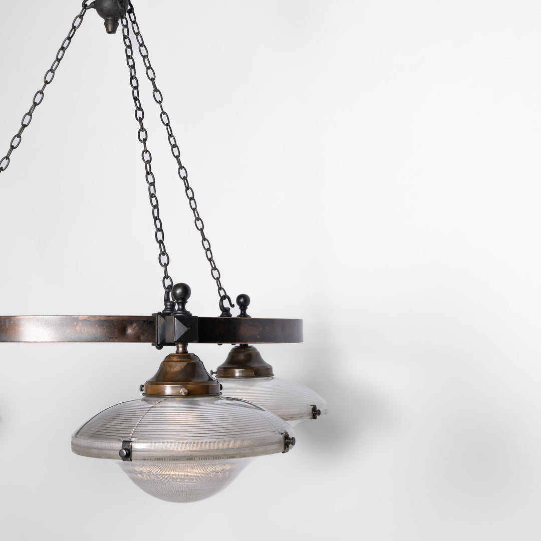 Rare Pair of Monumental Scale Antique Holophane Bronze Ring Chandeliers