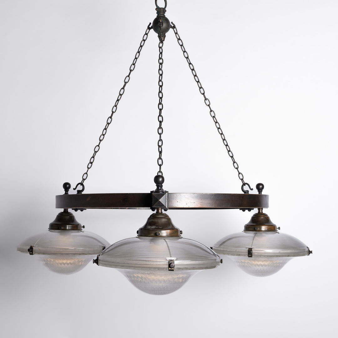 Rare Pair of Monumental Scale Antique Holophane Bronze Ring Chandeliers