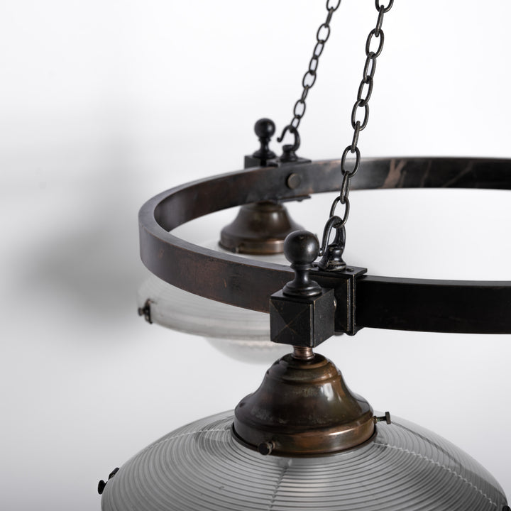 Rare Pair of Monumental Scale Antique Holophane Bronze Ring Chandeliers