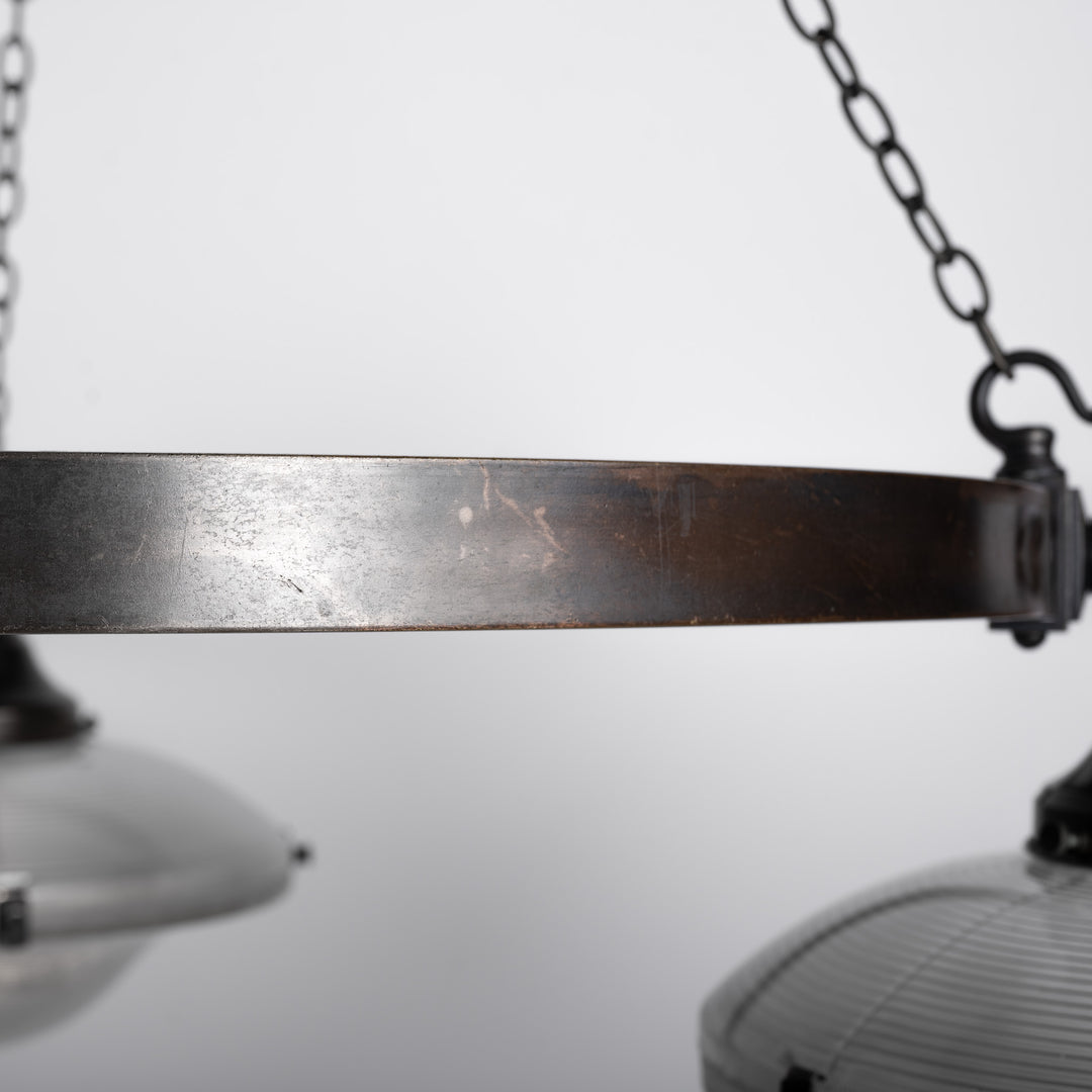 Rare Pair of Monumental Scale Antique Holophane Bronze Ring Chandeliers