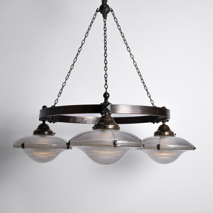 Rare Pair of Monumental Scale Antique Holophane Bronze Ring Chandeliers