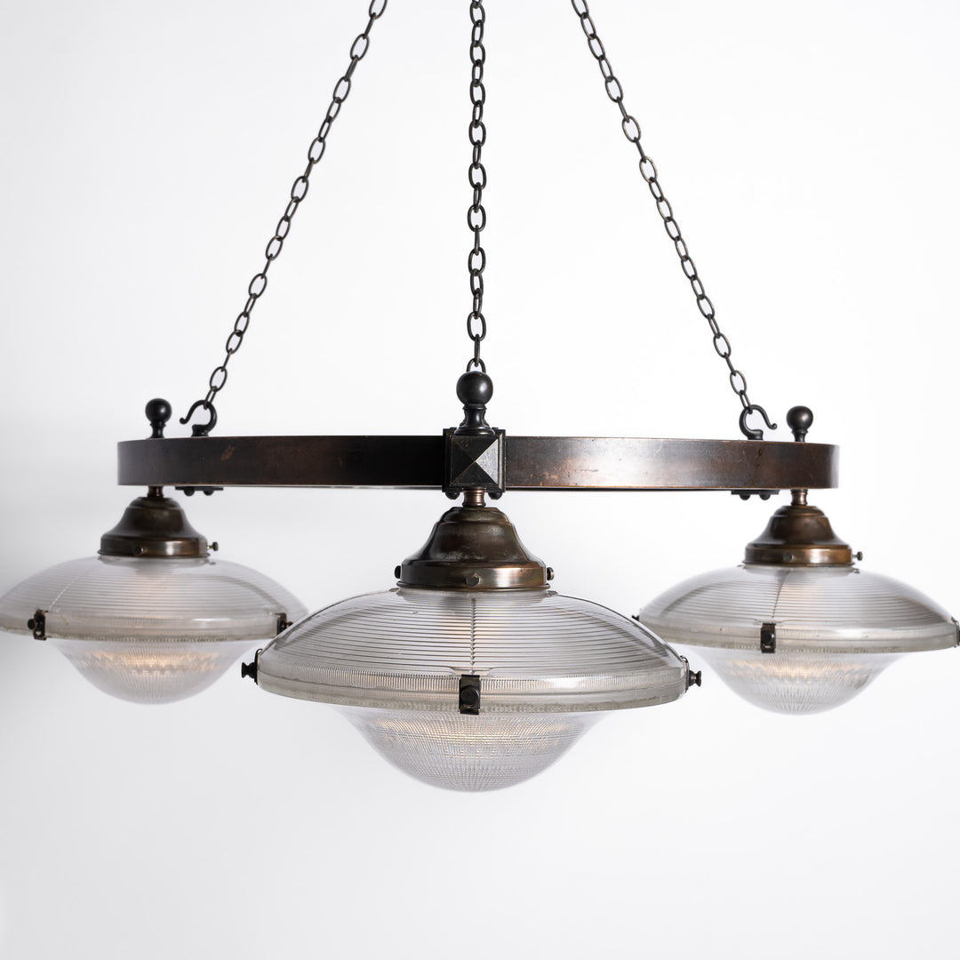 Rare Pair of Monumental Scale Antique Holophane Bronze Ring Chandeliers