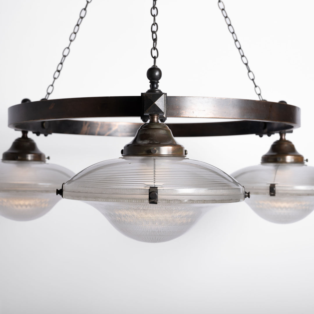 Rare Pair of Monumental Scale Antique Holophane Bronze Ring Chandeliers