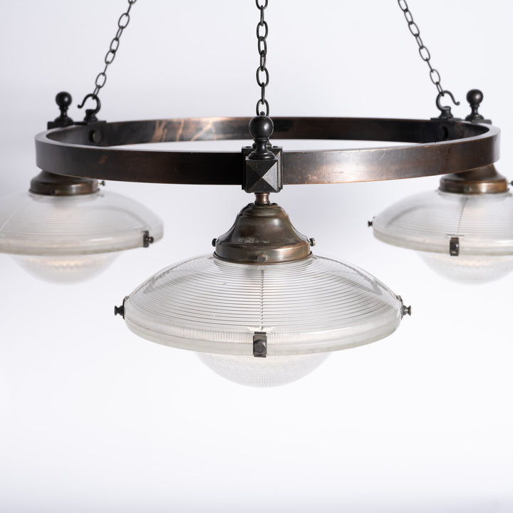 Rare Pair of Monumental Scale Antique Holophane Bronze Ring Chandeliers