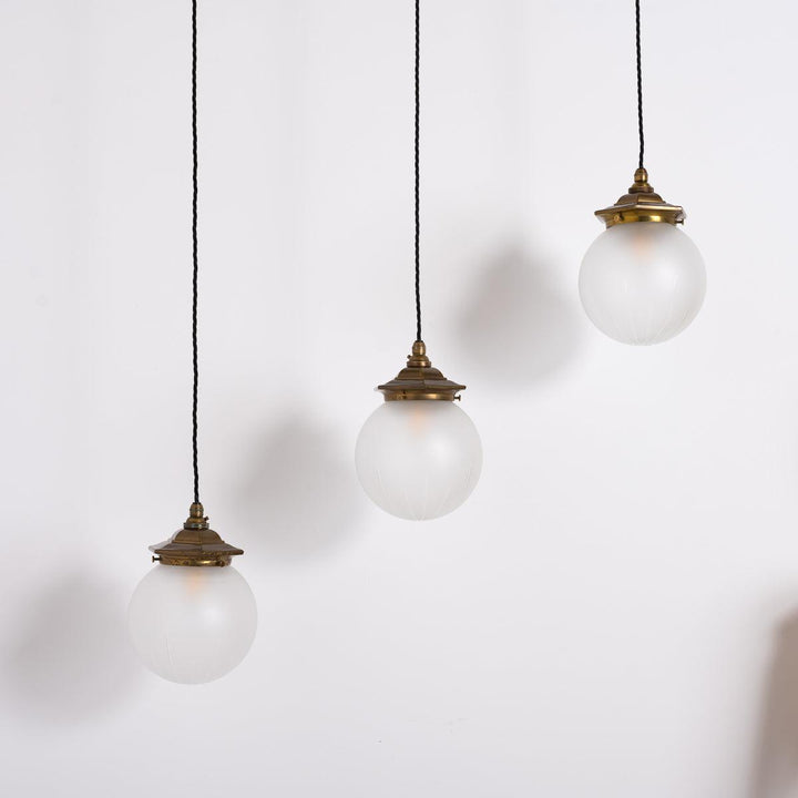 Trio of Satin Crystal Cut Glass Globe Shades with Aged Brass Hexagonal Galleries