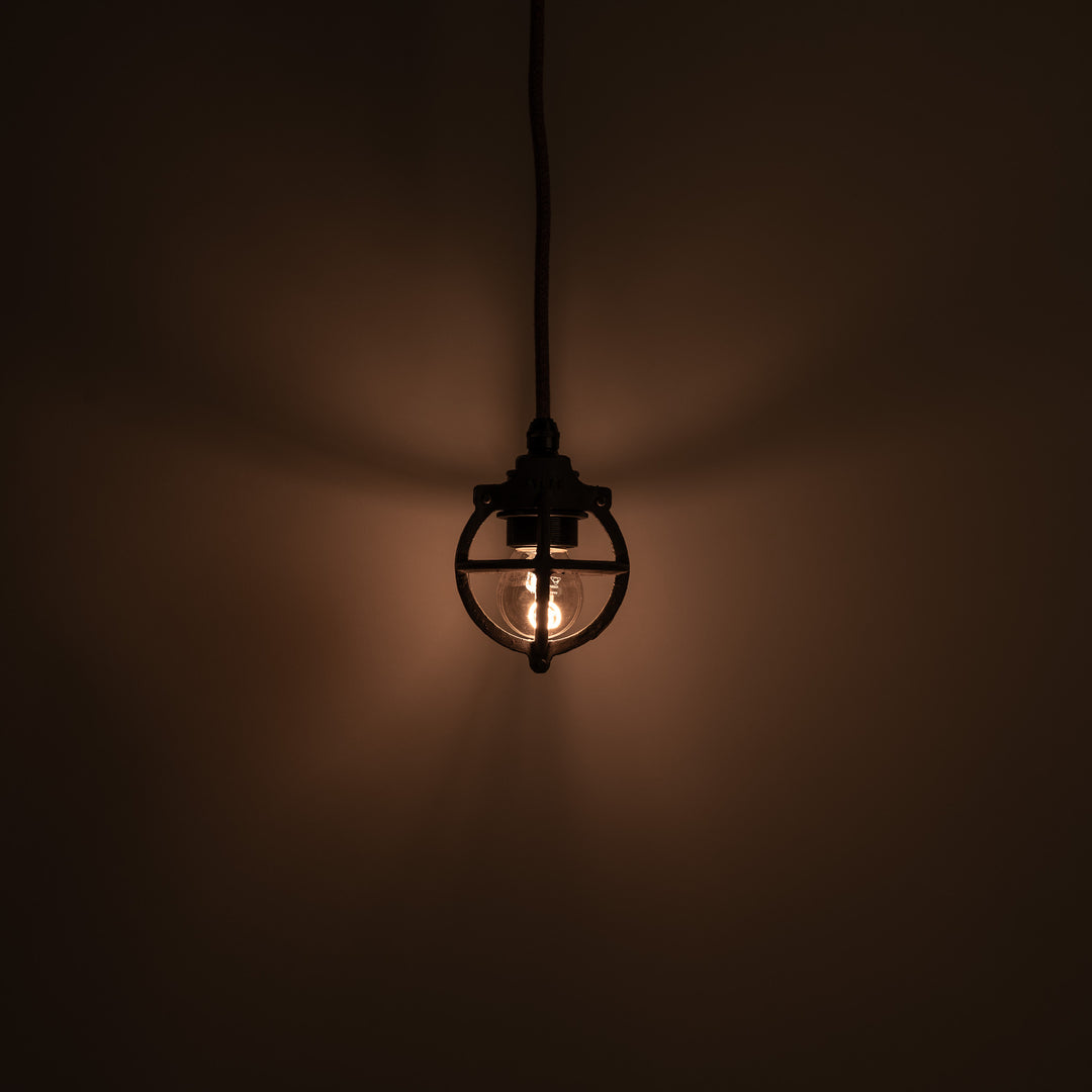Set of Three Atlas Cast Iron Globe Cage Pendants — Industrial Bulb Guards