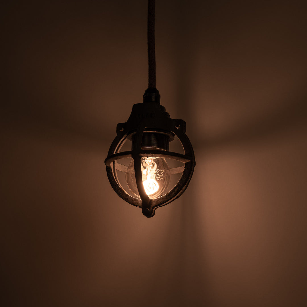 Set of Three Atlas Cast Iron Globe Cage Pendants — Industrial Bulb Guards
