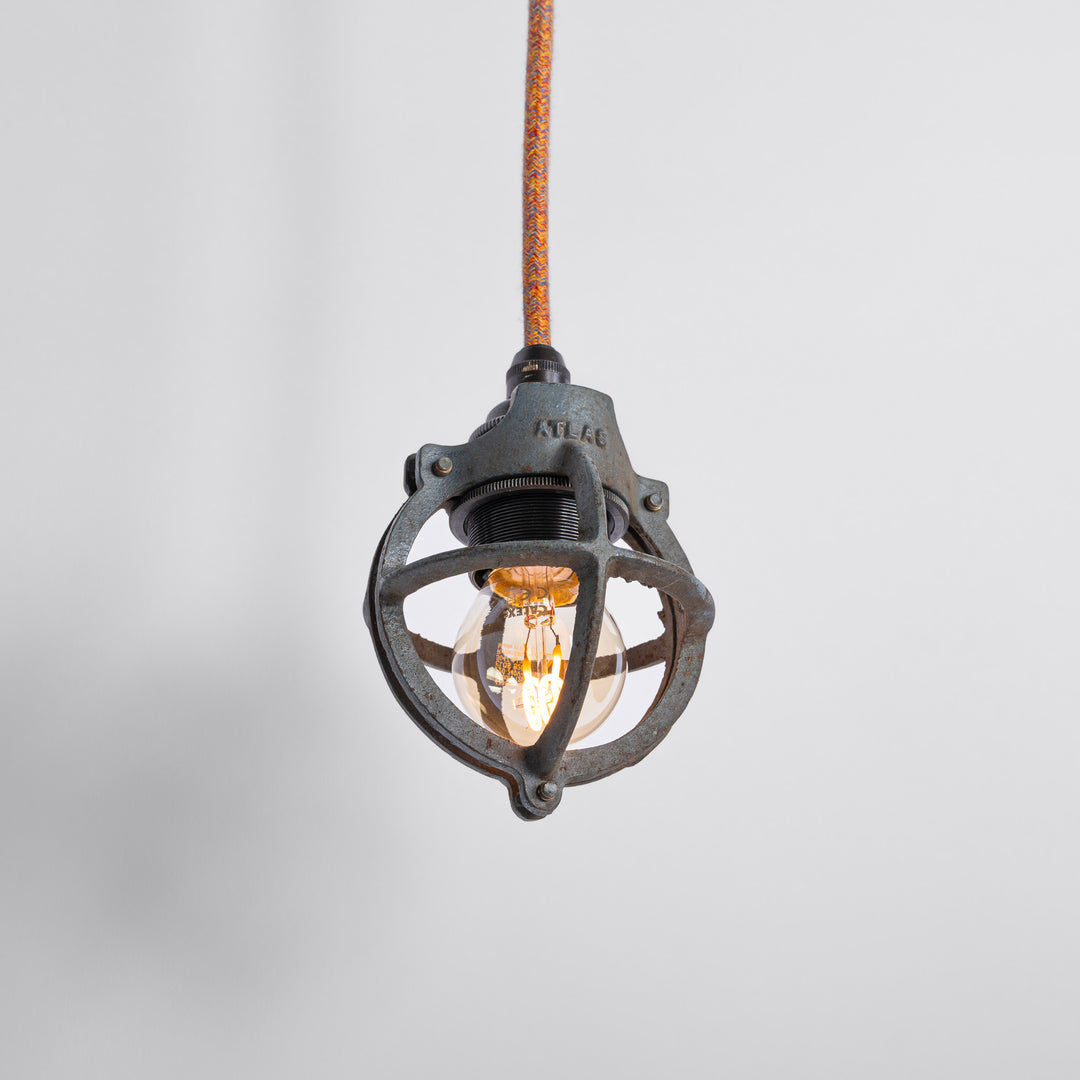 Set of Three Atlas Cast Iron Globe Cage Pendants — Industrial Bulb Guards