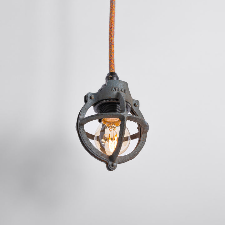 Set of Three Atlas Cast Iron Globe Cage Pendants — Industrial Bulb Guards